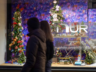 A shop window is festively decorated in Wasserburg am Inn, Bavaria, Germany, on December 15, 2024. (