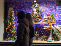 A shop window is festively decorated in Wasserburg am Inn, Bavaria, Germany, on December 15, 2024. (