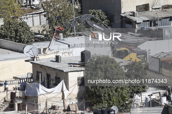 Jerusalem Municipality Machinery Demolished 11 Residential And Commercial Structures Today, December 16, 2024, In The Town Of Silwan, South...