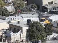 Jerusalem Municipality Machinery Demolished 11 Residential And Commercial Structures Today, December 16, 2024, In The Town Of Silwan, South...