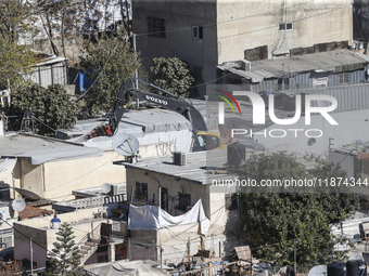 Jerusalem Municipality Machinery Demolished 11 Residential And Commercial Structures Today, December 16, 2024, In The Town Of Silwan, South...