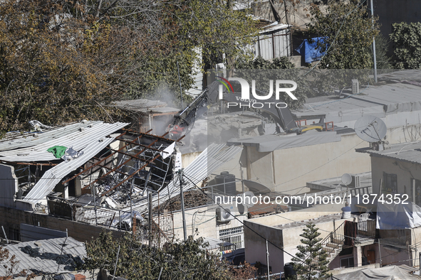 Jerusalem Municipality Machinery Demolished 11 Residential And Commercial Structures Today, December 16, 2024, In The Town Of Silwan, South...