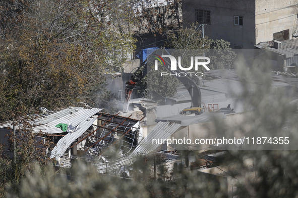 Jerusalem Municipality Machinery Demolished 11 Residential And Commercial Structures Today, December 16, 2024, In The Town Of Silwan, South...