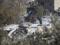 Jerusalem Municipality Machinery Demolished 11 Residential And Commercial Structures Today, December 16, 2024, In The Town Of Silwan, South...