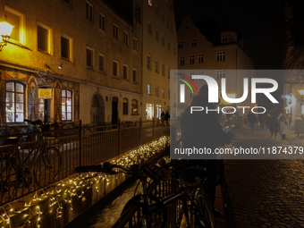 The old town of Augsburg, Bavaria, Germany, is in festive lighting on December 14, 2024. (