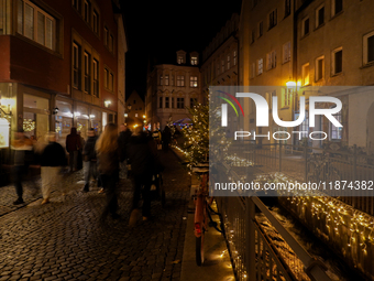 The old town of Augsburg, Bavaria, Germany, is in festive lighting on December 14, 2024. (