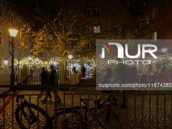 The old town of Augsburg, Bavaria, Germany, is in festive lighting on December 14, 2024. (