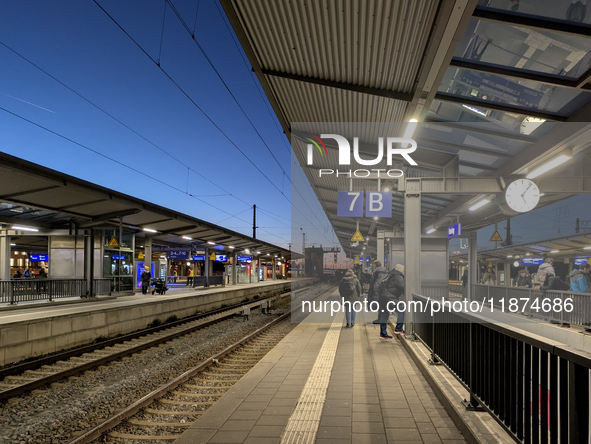 Pasing Station in Munich, Bavaria, Germany, on December 16, 2024, serves the daily rhythm of commuters and travelers. Passengers wait on the...