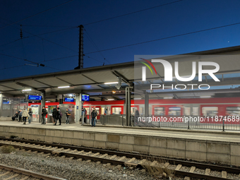 Commuters wait on platforms at Munich Pasing Station in Munich, Bavaria, Germany, on December 16, 2024. Munich Pasing Station, a key transpo...