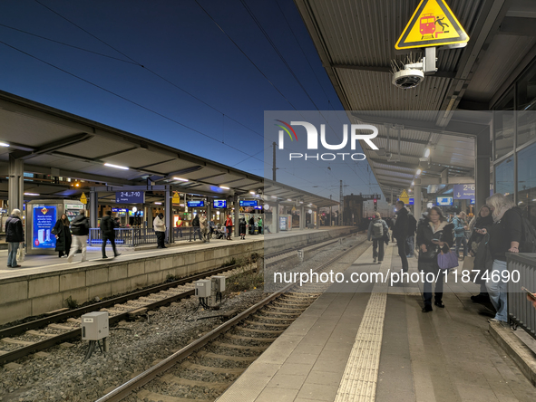 Commuters wait on platforms at Munich Pasing Station in Munich, Bavaria, Germany, on December 16, 2024. Munich Pasing Station, a key transpo...