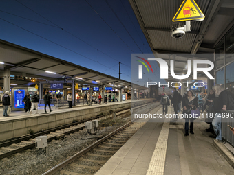 Commuters wait on platforms at Munich Pasing Station in Munich, Bavaria, Germany, on December 16, 2024. Munich Pasing Station, a key transpo...