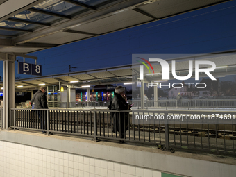 Pasing Station in Munich, Bavaria, Germany, on December 16, 2024, serves the daily rhythm of commuters and travelers. Passengers wait on the...