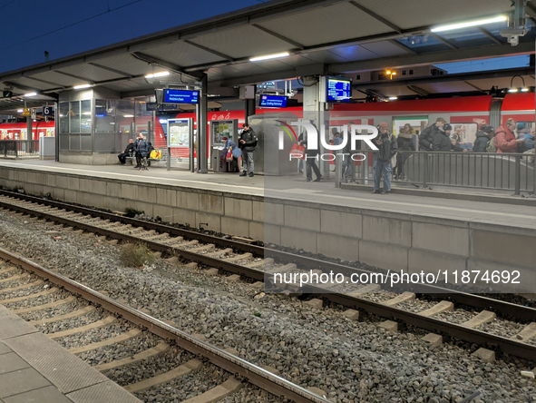 Pasing Station in Munich, Bavaria, Germany, on December 16, 2024, serves the daily rhythm of commuters and travelers. Passengers wait on the...