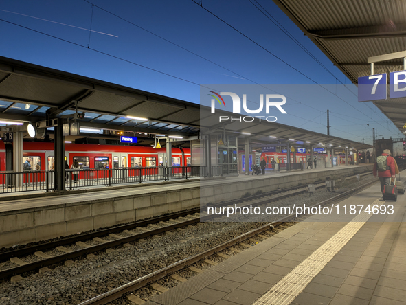 Pasing Station in Munich, Bavaria, Germany, on December 16, 2024, serves the daily rhythm of commuters and travelers. Passengers wait on the...