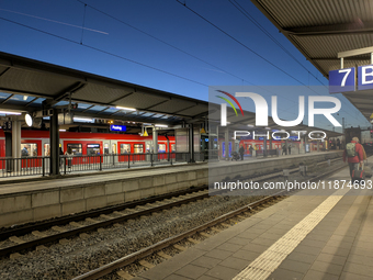 Pasing Station in Munich, Bavaria, Germany, on December 16, 2024, serves the daily rhythm of commuters and travelers. Passengers wait on the...