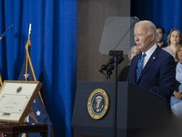 President Joe Biden signs a proclamation establishing a national monument to honor the first female Cabinet secretary, Frances Perkins, the...