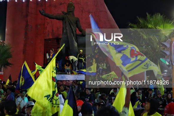 Hundreds of Club America fans attend the Coyote Monument in Ciudad Nezahualcoyotl to celebrate after Club America wins the first three-time...