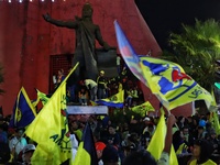 Hundreds of Club America fans attend the Coyote Monument in Ciudad Nezahualcoyotl to celebrate after Club America wins the first three-time...