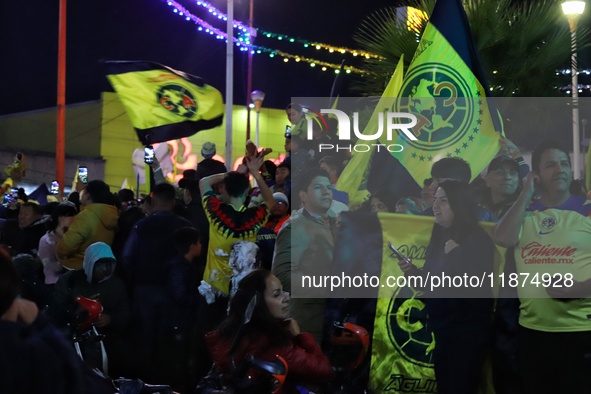 Hundreds of Club America fans attend the Coyote Monument in Ciudad Nezahualcoyotl to celebrate after Club America wins the first three-time...