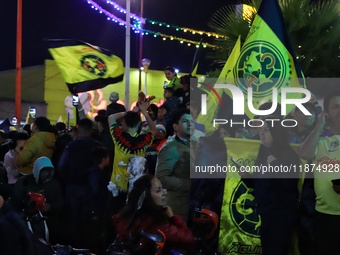 Hundreds of Club America fans attend the Coyote Monument in Ciudad Nezahualcoyotl to celebrate after Club America wins the first three-time...