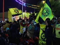 Hundreds of Club America fans attend the Coyote Monument in Ciudad Nezahualcoyotl to celebrate after Club America wins the first three-time...