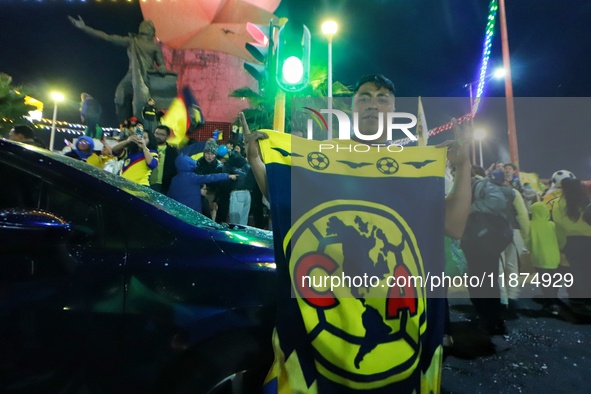 Hundreds of Club America fans attend the Coyote Monument in Ciudad Nezahualcoyotl to celebrate after Club America wins the first three-time...