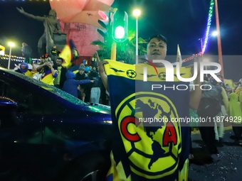 Hundreds of Club America fans attend the Coyote Monument in Ciudad Nezahualcoyotl to celebrate after Club America wins the first three-time...