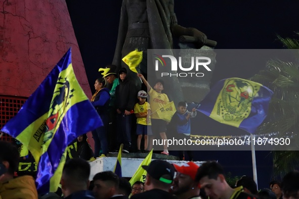 Hundreds of Club America fans attend the Coyote Monument in Ciudad Nezahualcoyotl to celebrate after Club America wins the first three-time...