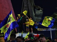 Hundreds of Club America fans attend the Coyote Monument in Ciudad Nezahualcoyotl to celebrate after Club America wins the first three-time...