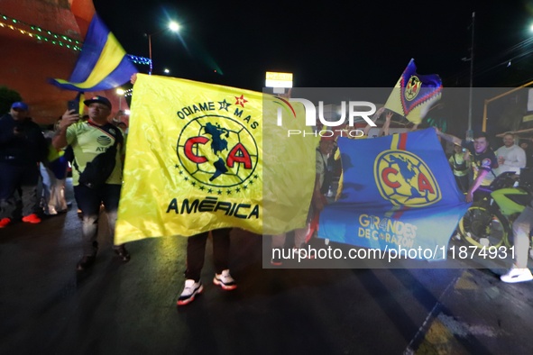 Hundreds of Club America fans attend the Coyote Monument in Ciudad Nezahualcoyotl to celebrate after Club America wins the first three-time...