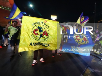 Hundreds of Club America fans attend the Coyote Monument in Ciudad Nezahualcoyotl to celebrate after Club America wins the first three-time...