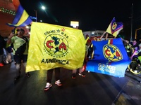 Hundreds of Club America fans attend the Coyote Monument in Ciudad Nezahualcoyotl to celebrate after Club America wins the first three-time...