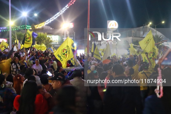 Hundreds of Club America fans attend the Coyote Monument in Ciudad Nezahualcoyotl to celebrate after Club America wins the first three-time...