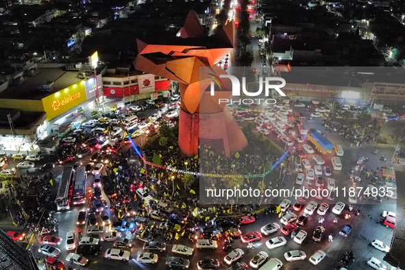 Hundreds of Club America fans attend the Coyote Monument in Ciudad Nezahualcoyotl to celebrate after Club America wins the first three-time...