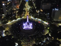 Hundreds of Club America fans attend the Angel de la Independencia Monument to celebrate after Club America wins the first three-time champi...