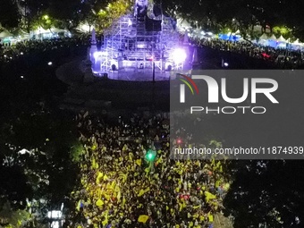 Hundreds of Club America fans attend the Angel de la Independencia Monument to celebrate after Club America wins the first three-time champi...