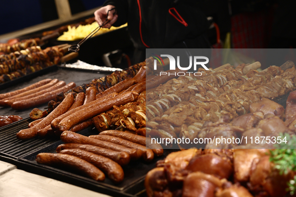 Sausages are seen on a stand at the Christmas fair at Main Square in Krakow, Poland on December 16, 2024. 