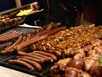 Sausages are seen on a stand at the Christmas fair at Main Square in Krakow, Poland on December 16, 2024. (