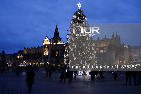 A view of Cloth Hall the Christmas tree at Main Square in Krakow, Poland on December 16, 2024. 