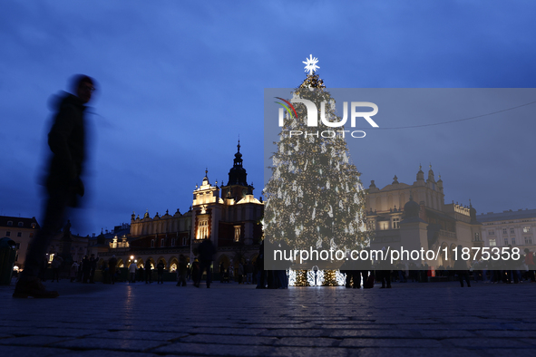 A view of Cloth Hall the Christmas tree at Main Square in Krakow, Poland on December 16, 2024. 