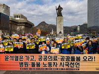 Healthcare and care workers hold a rally at Gwanghwamun Square in Seoul, South Korea, on December 17, 2024, calling for the strengthening of...