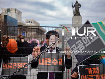 Officials from the Korean Health and Medical Workers' Union, under the Korean Confederation of Trade Unions Public Transport Workers' Union,...