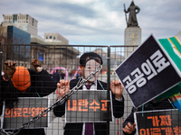 Officials from the Korean Health and Medical Workers' Union, under the Korean Confederation of Trade Unions Public Transport Workers' Union,...