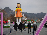 A 7-meter-tall statue of Young-hee, the iconic doll from the Netflix series Squid Game, is displayed at Gwanghwamun Square in Seoul, South K...