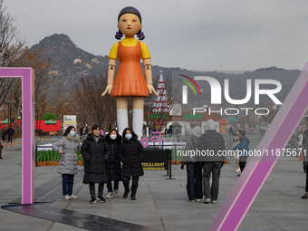 A 7-meter-tall statue of Young-hee, the iconic doll from the Netflix series Squid Game, is displayed at Gwanghwamun Square in Seoul, South K...