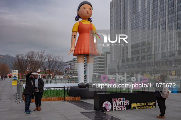 A 7-meter-tall statue of Young-hee, the iconic doll from the Netflix series Squid Game, is displayed at Gwanghwamun Square in Seoul, South K...