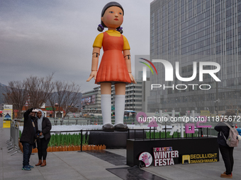 A 7-meter-tall statue of Young-hee, the iconic doll from the Netflix series Squid Game, is displayed at Gwanghwamun Square in Seoul, South K...