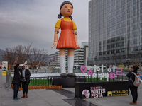 A 7-meter-tall statue of Young-hee, the iconic doll from the Netflix series Squid Game, is displayed at Gwanghwamun Square in Seoul, South K...