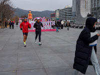 A 7-meter-tall statue of Young-hee, the iconic doll from the Netflix series Squid Game, is displayed at Gwanghwamun Square in Seoul, South K...