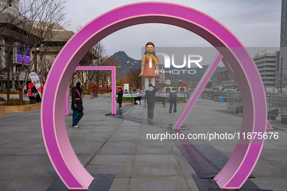 A 7-meter-tall statue of Young-hee, the iconic doll from the Netflix series Squid Game, is displayed at Gwanghwamun Square in Seoul, South K...